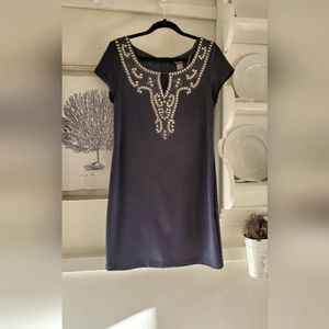 Studded knee length navy dress like new worn once. Very pretty.